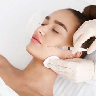 Plastic,Surgery.,Young,Woman,Receiving,Botox,Injection,In,Beauty,Clinic